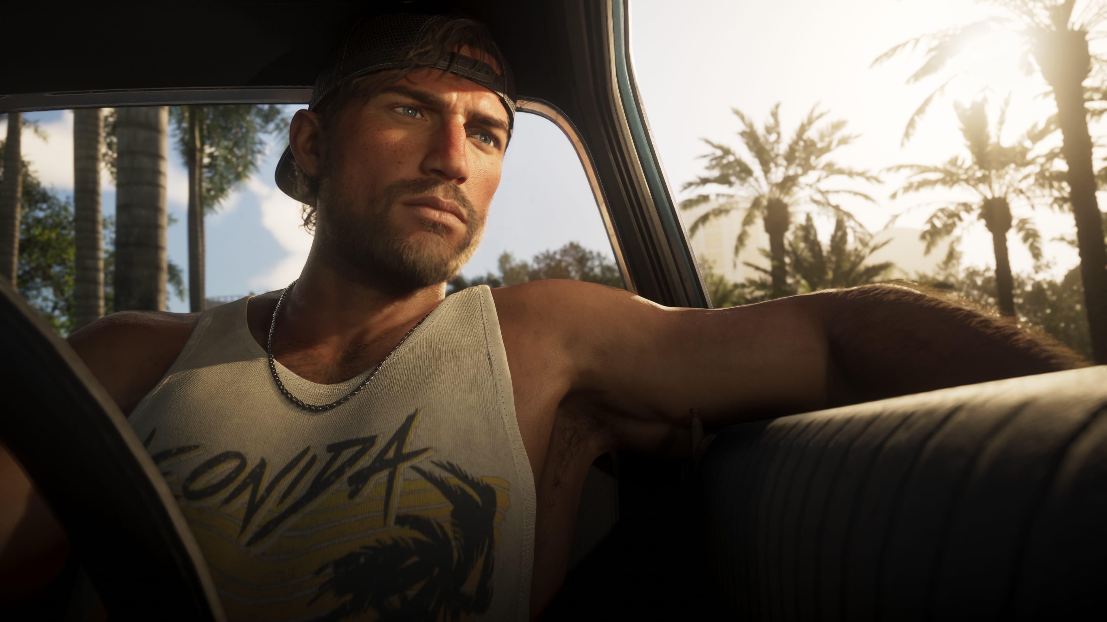 Jason Duval standing beside a green motorcycle in an official GTA VI screenshot.